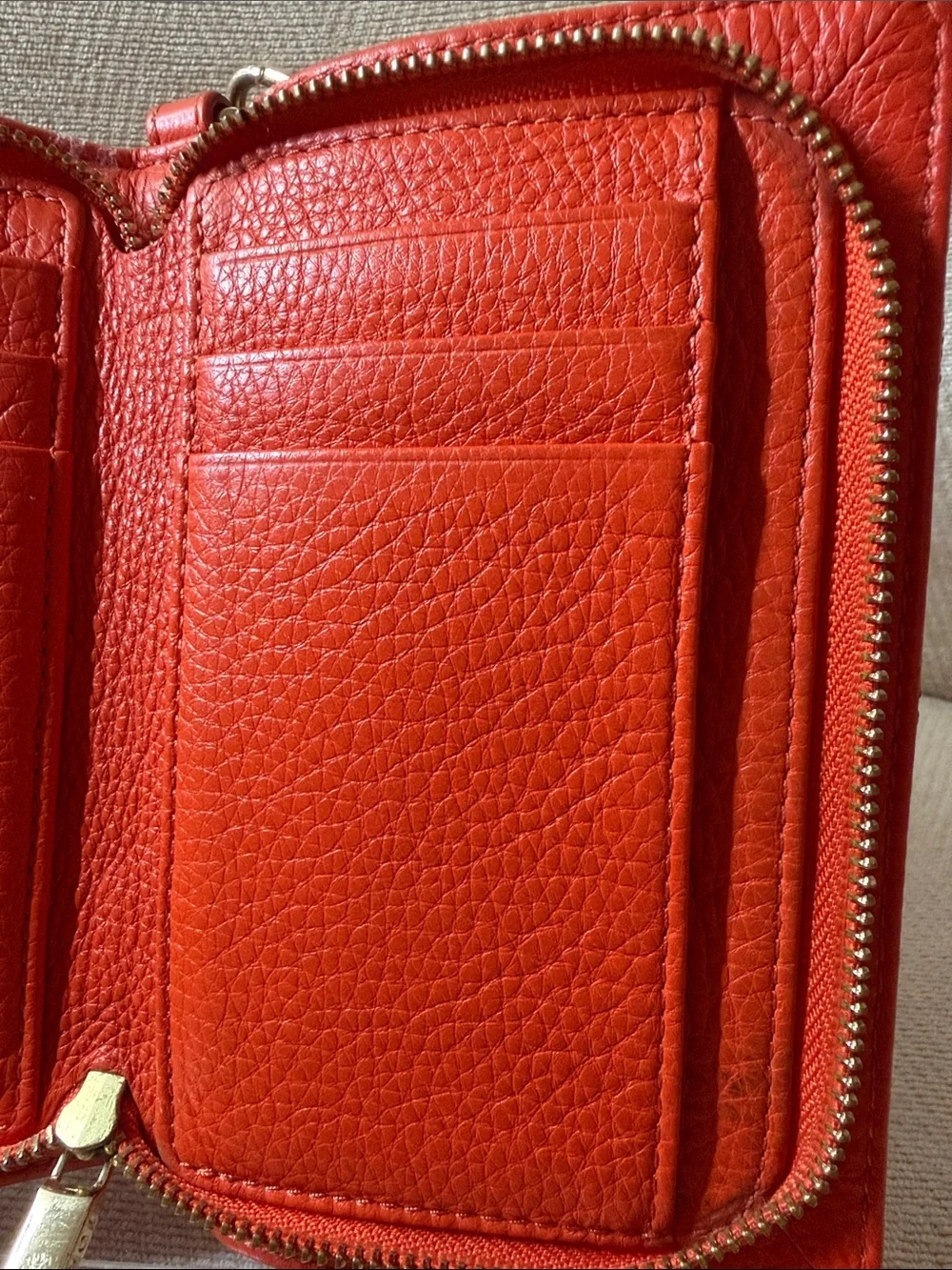 Tory Burch Orange Leather Wristlet with Logo Medallion